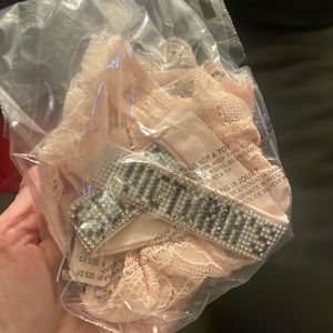 Pink lace thong with rhinestone Victoria’s Secret on the hips, size medium